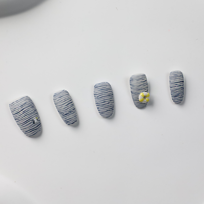 Nautical Press-On Nails with Navy Blue Stripes and 3D Yellow Flower Accent, Fresh Handcrafted Short Oval Nails, Fake Nails Art